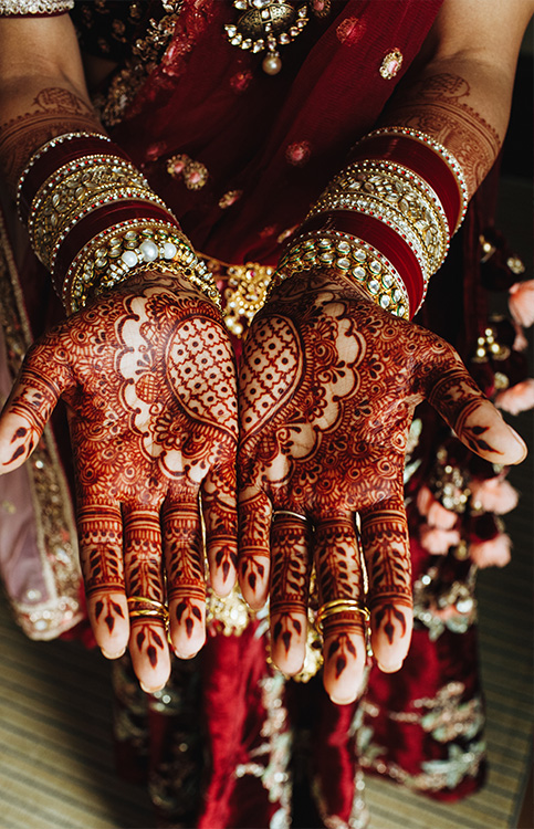 hands painted in henna